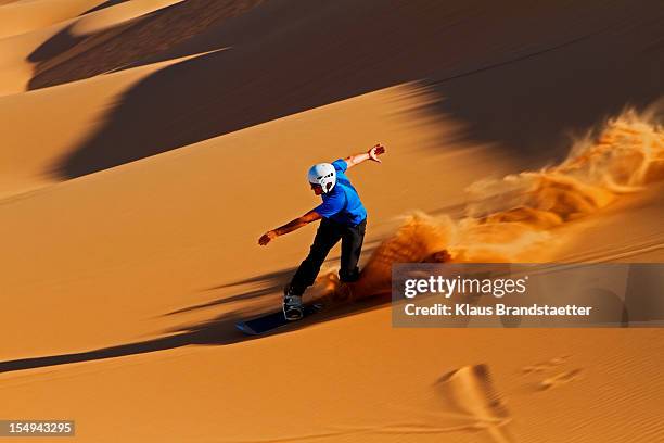 sandboarding skakopmund - sand boarding stock pictures, royalty-free photos & images