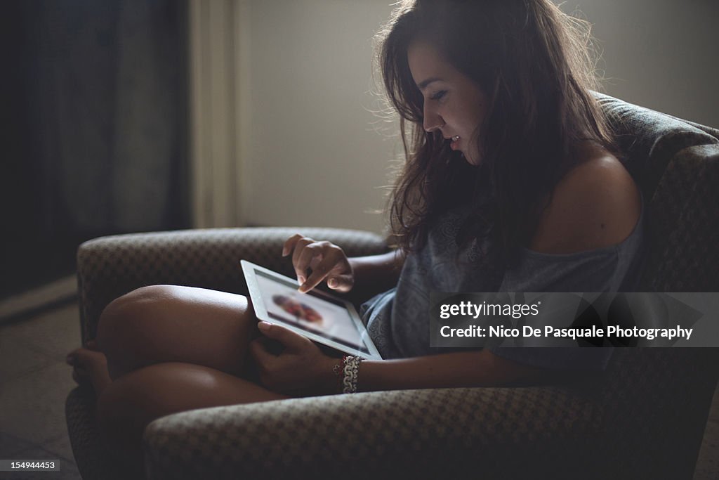 Young girl using digital tablet