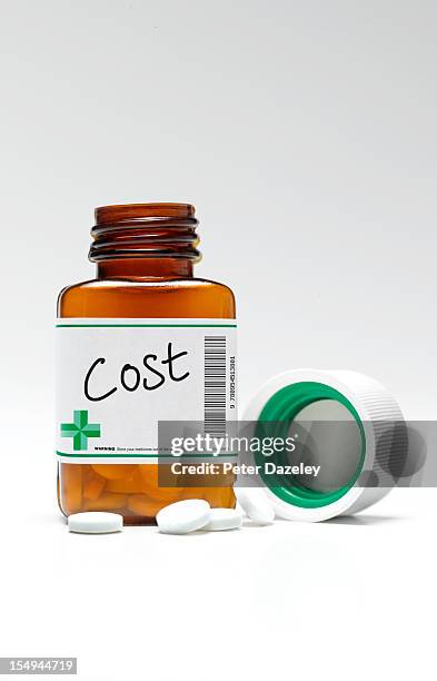 cost of healthcare - prescription drug costs stock pictures, royalty-free photos & images