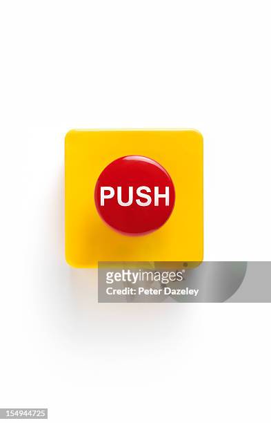 push button on white background - bedienungsknopf stock-fotos und bilder