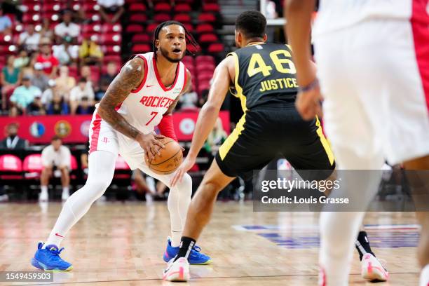 Cam Whitmore of the Houston Rockets eyes the basket against Jordan Usher of the Utah Jazz in the first half of a 2023 NBA Summer League game at the...