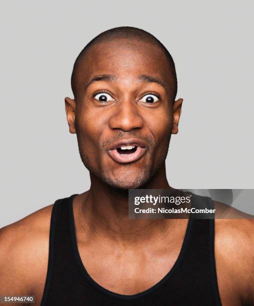 surprised and delighted african american man - ecstatic face stock pictures, royalty-free photos & images