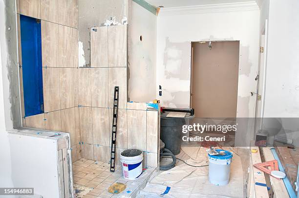 master bathroom remodeling: tiling in the shower - home extension stock pictures, royalty-free photos & images
