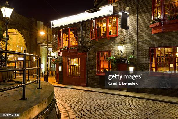 english pub, restaurant, london, england, uk - street light banner stock pictures, royalty-free photos & images