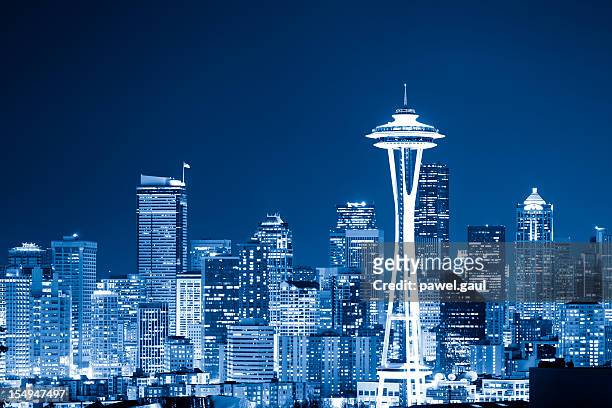 skyline of seattle by night - seattle stock pictures, royalty-free photos & images
