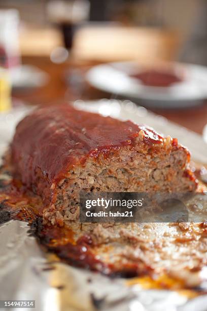 meatloaf at the dinne table - meatloaf stock pictures, royalty-free photos & images