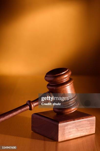 antique brown gavel and sound block - auctioneer stock pictures, royalty-free photos & images