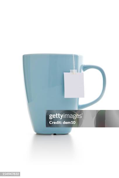 tea bags in mug - tea bags stock pictures, royalty-free photos & images