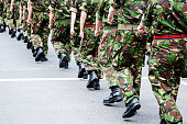 Soldiers marching in line
