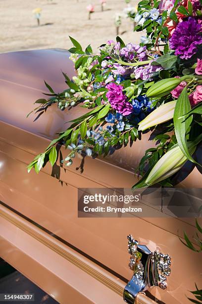 flower draped coffin - metal flower arrangement stock pictures, royalty-free photos & images