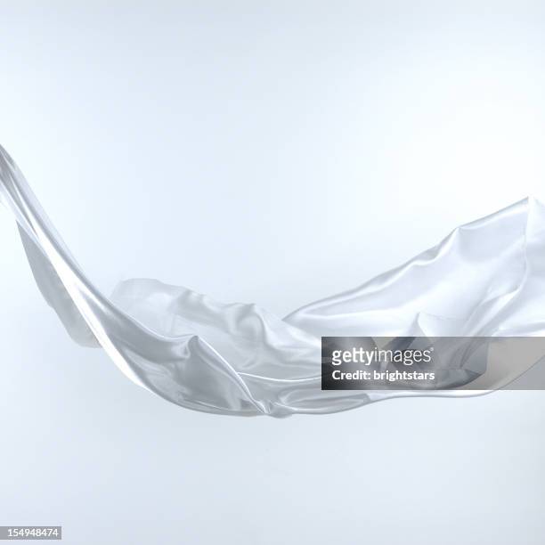 flying white satin - draped cloth stock pictures, royalty-free photos & images