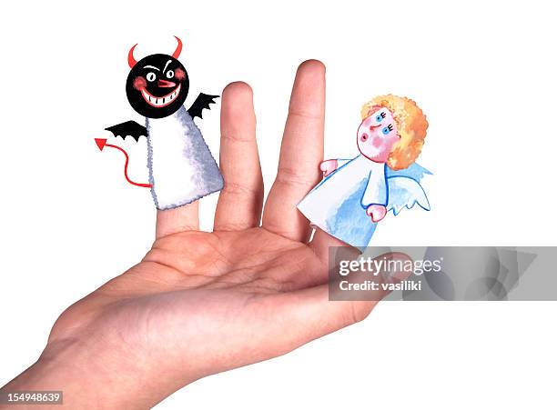 good and evil finger dolls - good evil stock pictures, royalty-free photos & images