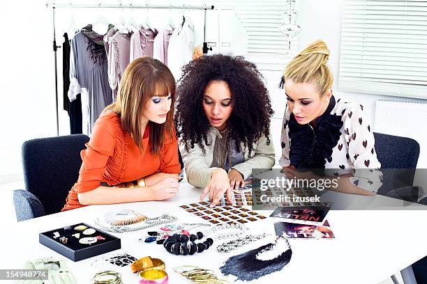 fashion magazine meeting - editorial office stock pictures, royalty-free photos & images