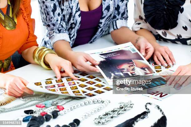 fashion magazine meeting - magazine table stock pictures, royalty-free photos & images