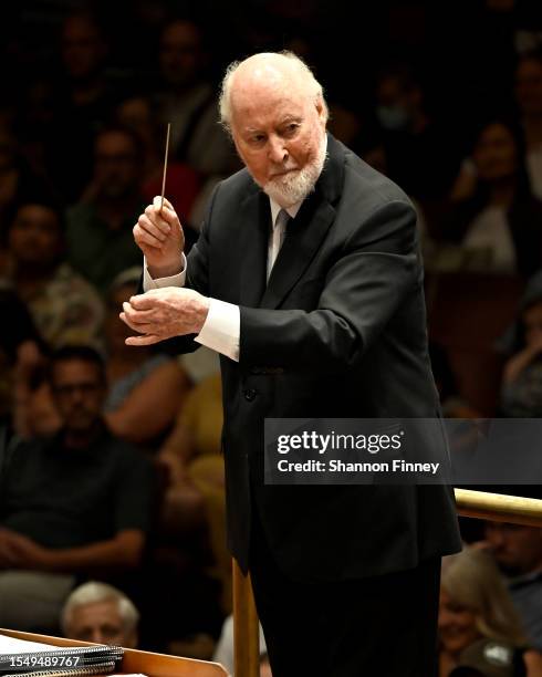 Composer John Williams conducts a concert celebrating the 225th anniversary of "The President's Own" United States Marine Band at the Kennedy Center...