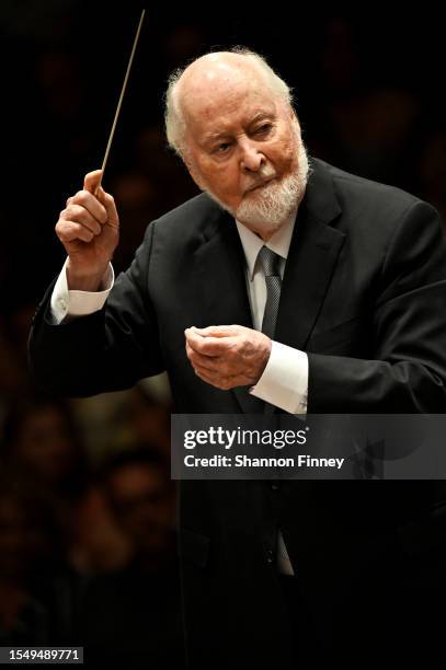 Composer John Williams conducts a concert celebrating the 225th anniversary of "The President's Own" United States Marine Band at the Kennedy Center...