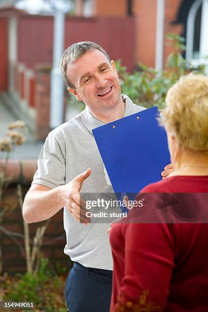 salesman introduces himself - dörrförsäljare bildbanksfoton och bilder