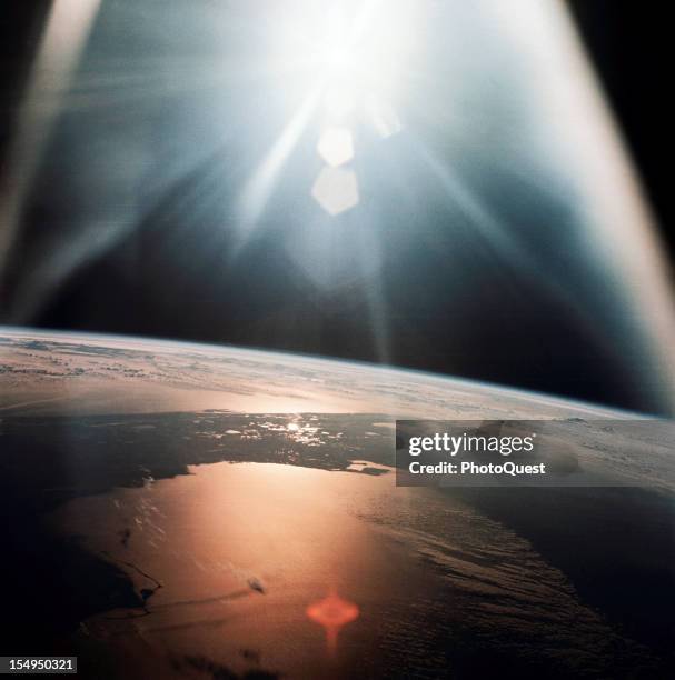 View from the Apollo 7 spacecraft of the Gulf of Mexico and the Atlantic Ocean as they reflect the sun, October 20, 1968.