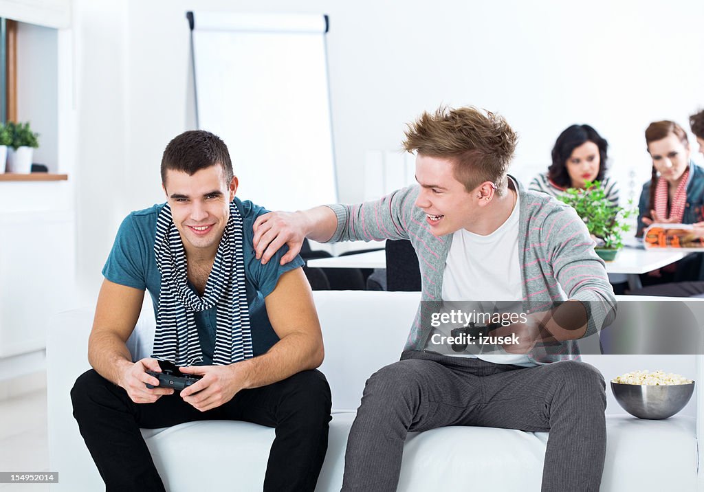 Friends playing video game