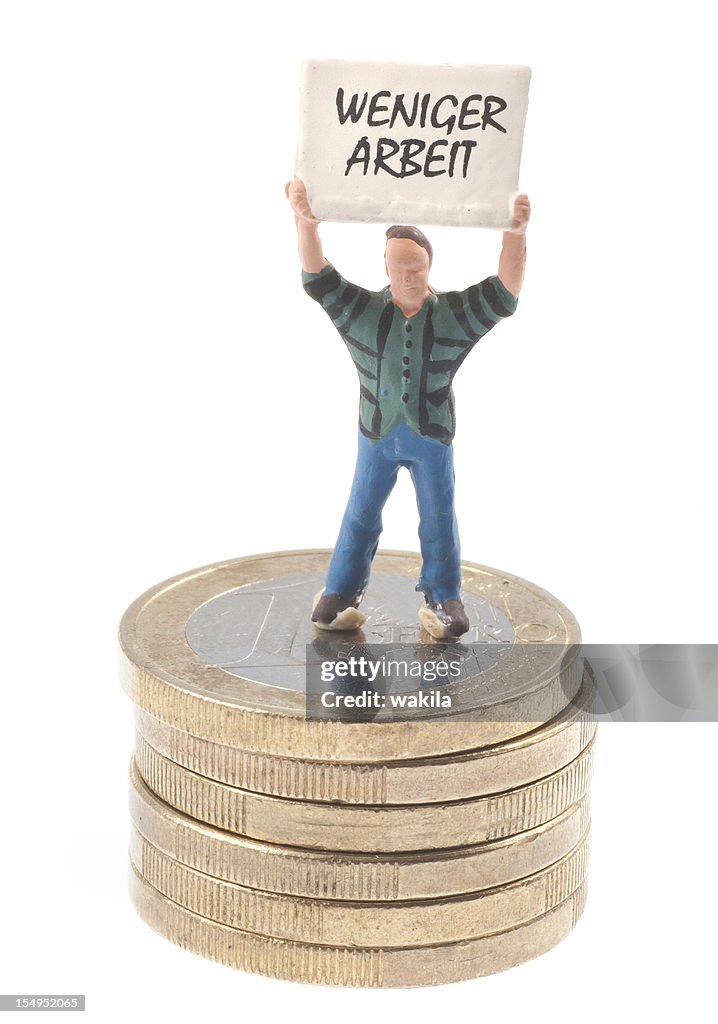 Less work males with shield on stack of euro coins