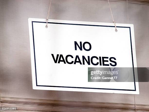 sign in window of guest house, saying "no vacancies" - no vacancies stock pictures, royalty-free photos & images