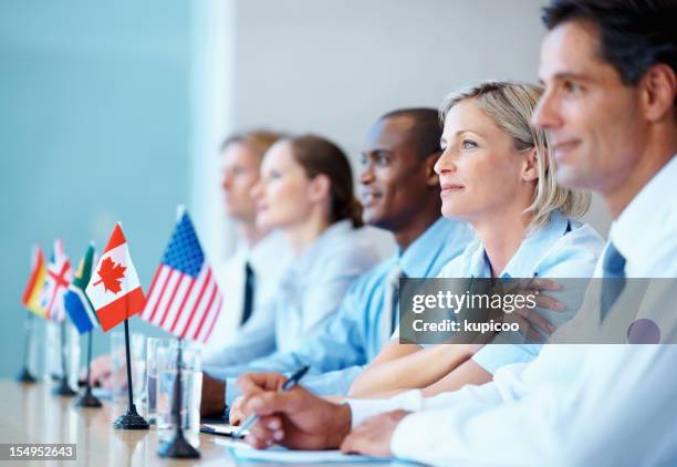 international business team in a meeting - united nations stockfoto's en -beelden