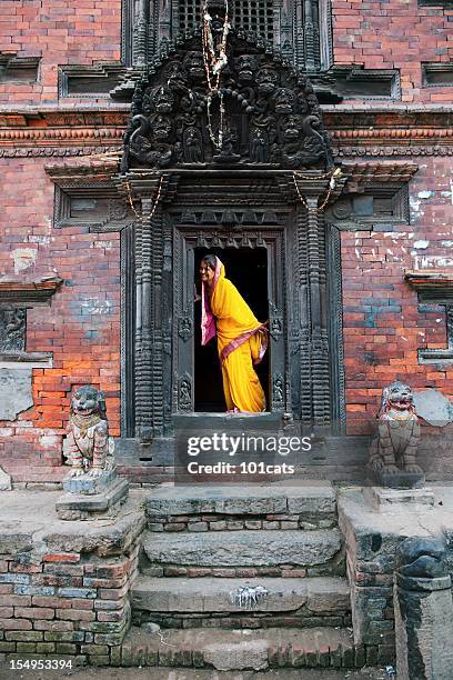 lady in yellow - kathmandu stock pictures, royalty-free photos & images