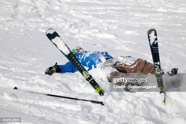 skiing accident - funny snow skiing stock pictures, royalty-free photos & images