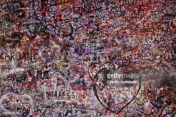 love wall at juliet's house in verona, italy - love graffiti stock pictures, royalty-free photos & images