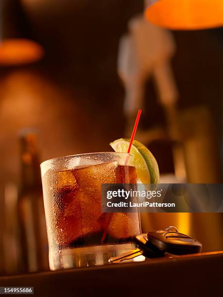 drinking and driving - drinking soda in car stock pictures, royalty-free photos & images
