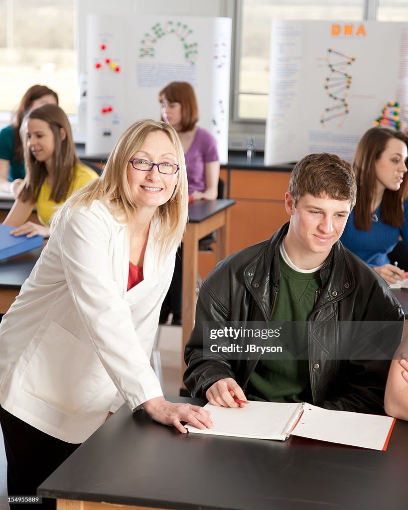 School Science Teacher Instructing Students Learning Classroom High-Res ...