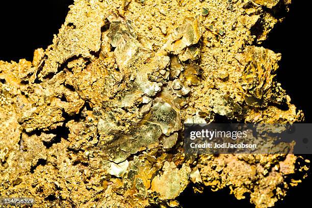 the soaring price of gold - panning stock pictures, royalty-free photos & images