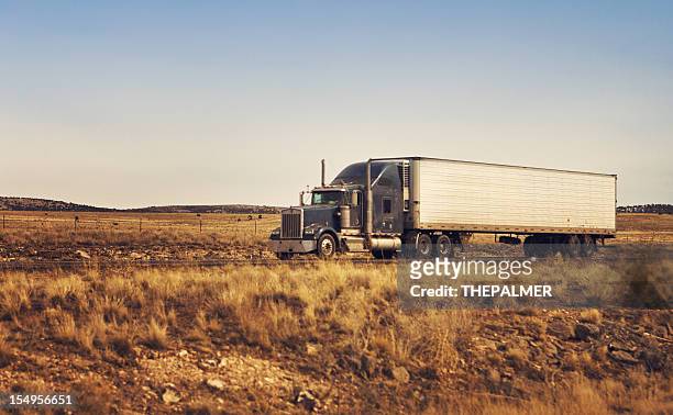 semi-truck on the highway - country road side stock pictures, royalty-free photos & images