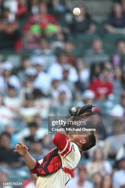 Matt Thaiss of the Los Angeles Angels makes a catch for the final out against the Houston Astros during the seventh inning at Angel Stadium of...