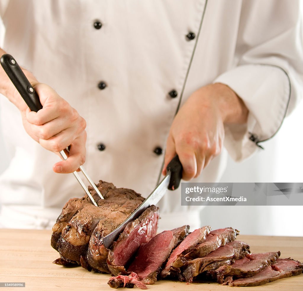 Chef Carving Perfectly Cooked Prime Rib Roast Beef High-Res Stock Photo ...