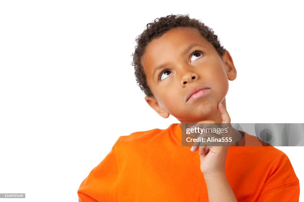 8-year old mixed race boy thinking on white