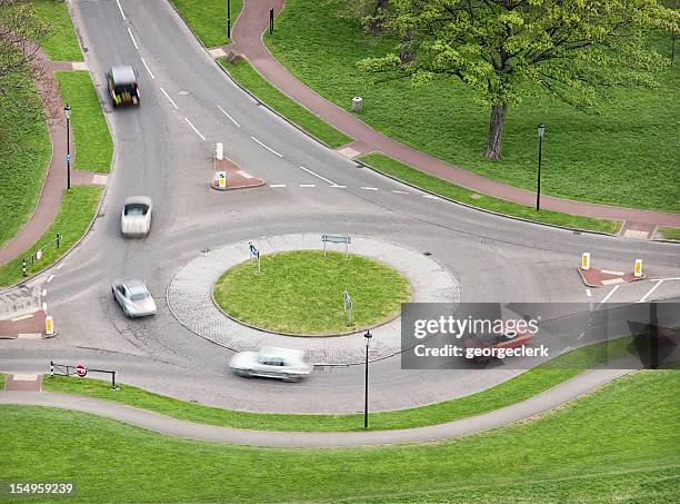 british roundabout traffic - traffic circle stock pictures, royalty-free photos & images
