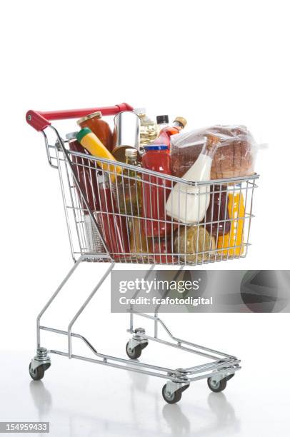 shopping einkaufswagen - einkaufswagen freisteller stock-fotos und bilder