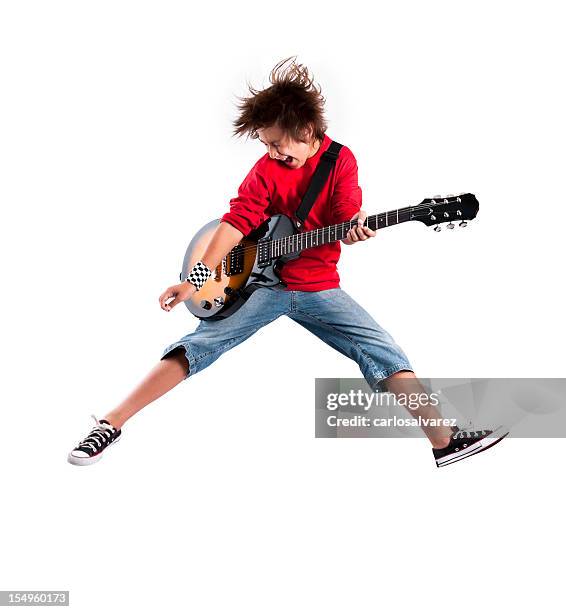 kid playing the guitar while jumping in the air - musical instrument white background stock pictures, royalty-free photos & images