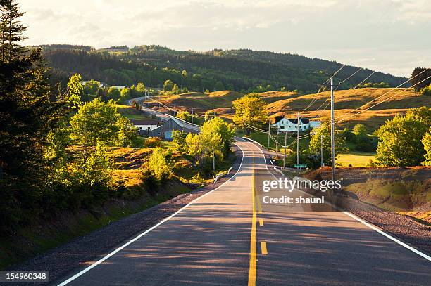 winding country road - nova scotia road stock pictures, royalty-free photos & images