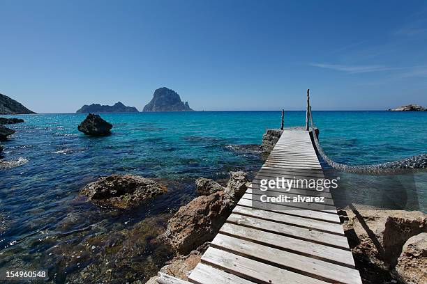 cala d'hort in ibiza spain - beach at cala d'or stock pictures, royalty-free photos & images