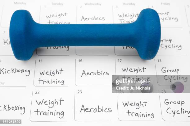 healthy lifestyle: exercise schedule - wellness program stock pictures, royalty-free photos & images
