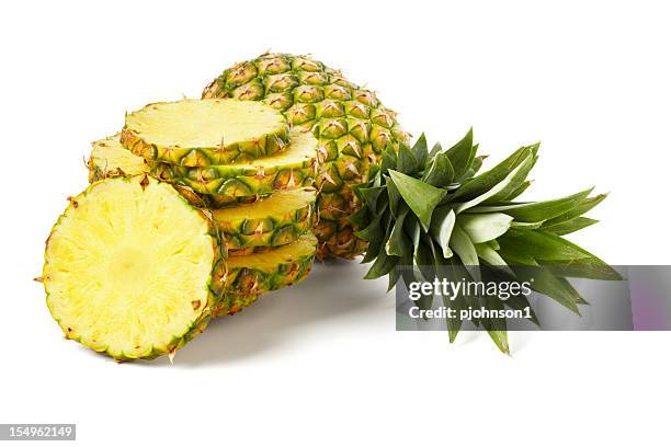 sliced pineapple - pineapple stock pictures, royalty-free photos & images