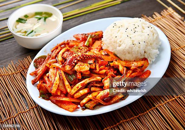 spicy squid - korean culture stock pictures, royalty-free photos & images