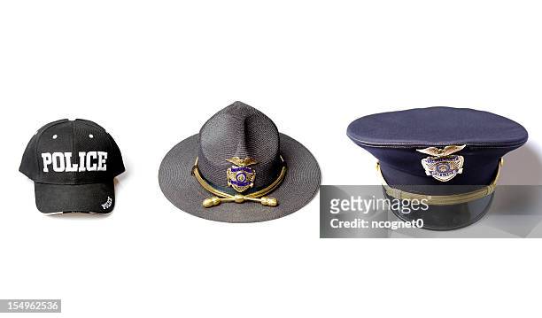 police officer hat selection - silver hat stock pictures, royalty-free photos & images