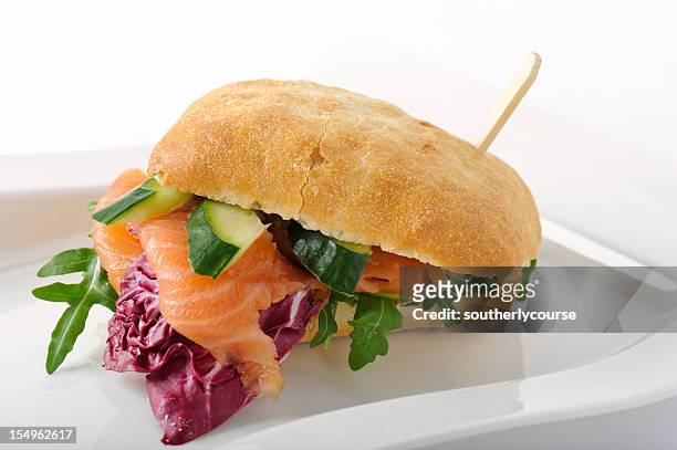 räucherlachs-sandwich - ciabatta stock-fotos und bilder