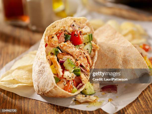 grilled chicken salad pita sandwich - whole wheat pitta stock pictures, royalty-free photos & images