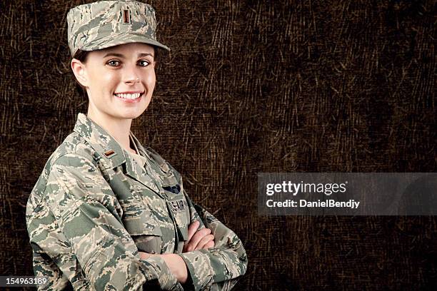 us air force series: american airwoman smiling - us air force pilot stock pictures, royalty-free photos & images