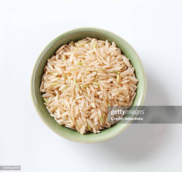 arroz integral - arroz integral fotografías e imágenes de stock