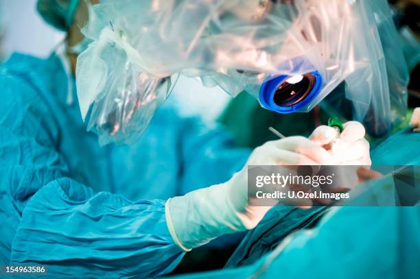 surgical microscope - microchirurgie stockfoto's en -beelden